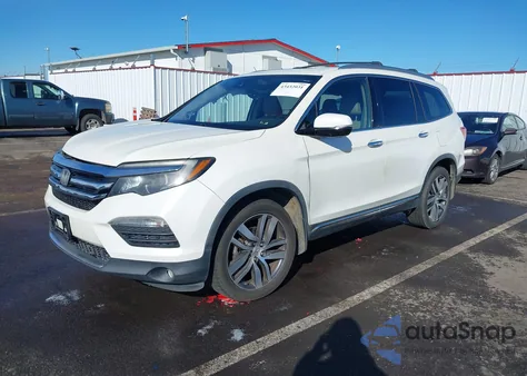 2016 Honda Pilot Touring z USA, uszkodzony, nr VIN 5FNYF6H98GB098925